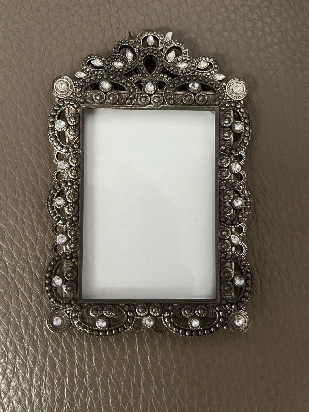 very cute photo frame, silver color with stones